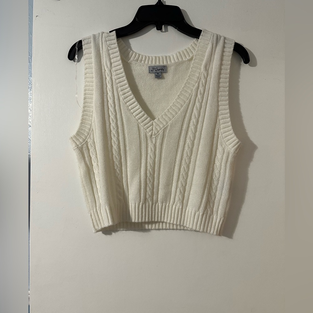 White sweater vest